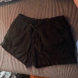 black old navy shorts. Size S but fits like a medium and u can adjust them